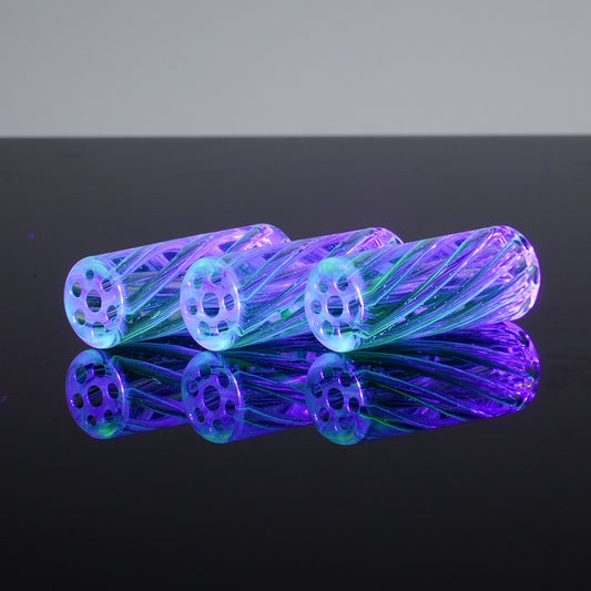 Glowing purple and blue fiber optic cable on a reflective black surface